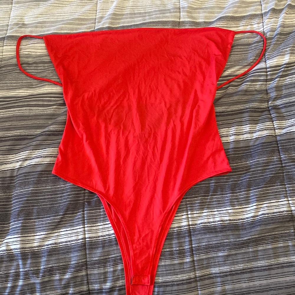 Red body suit open back